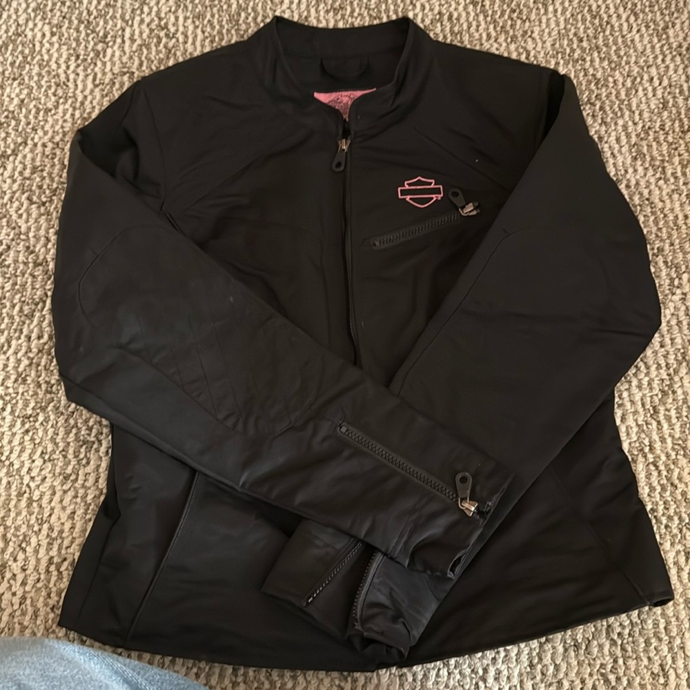 Black Harley Davison riding coat with pink and pink jewls
